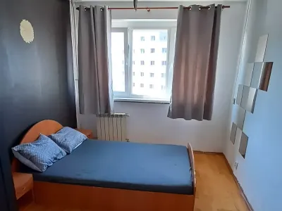 dormitor primitor cu fereastră apartament inchiriere Sector 6, București